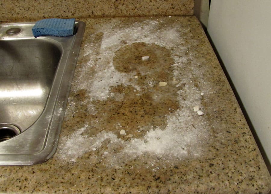 Dish soap and baking soda solution on granite.